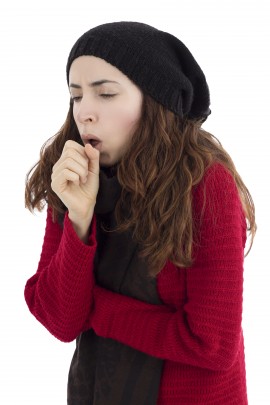 Woman coughing coughing cures, honey cough drops